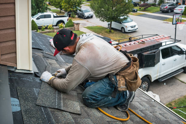Professional Roofing technician working in Weaverville, NC